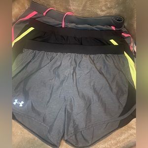3 pair of Under Armor performance shorts. Gently used. No rips or stains.